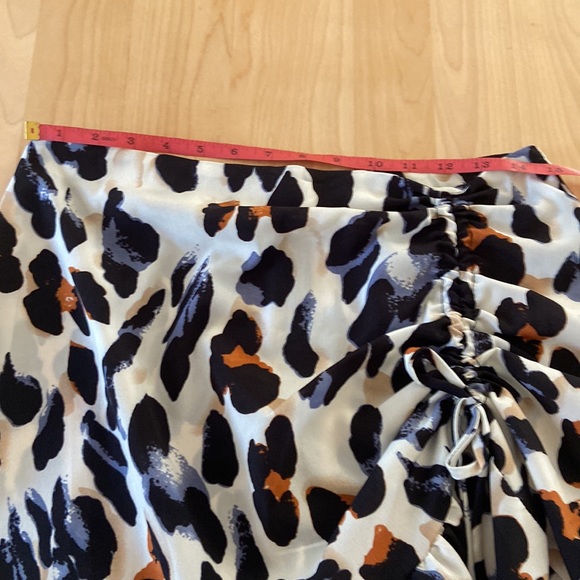 Cheeta print skirt, worn once. Blue, black, brown, and cream. Good condition. - Picture 6 of 10